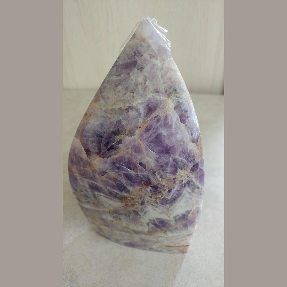 Amethyst Free Form Amethyst relieves physical, emotional and psychological pain or stress.  This stone reduces bruising, injuries and swellings.  Aids in treating hearing disorders.