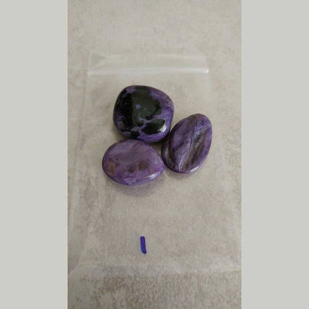 Charoite it re-energizes the body when exhausted, heals and integrates dualities and regulates blood pressure.  