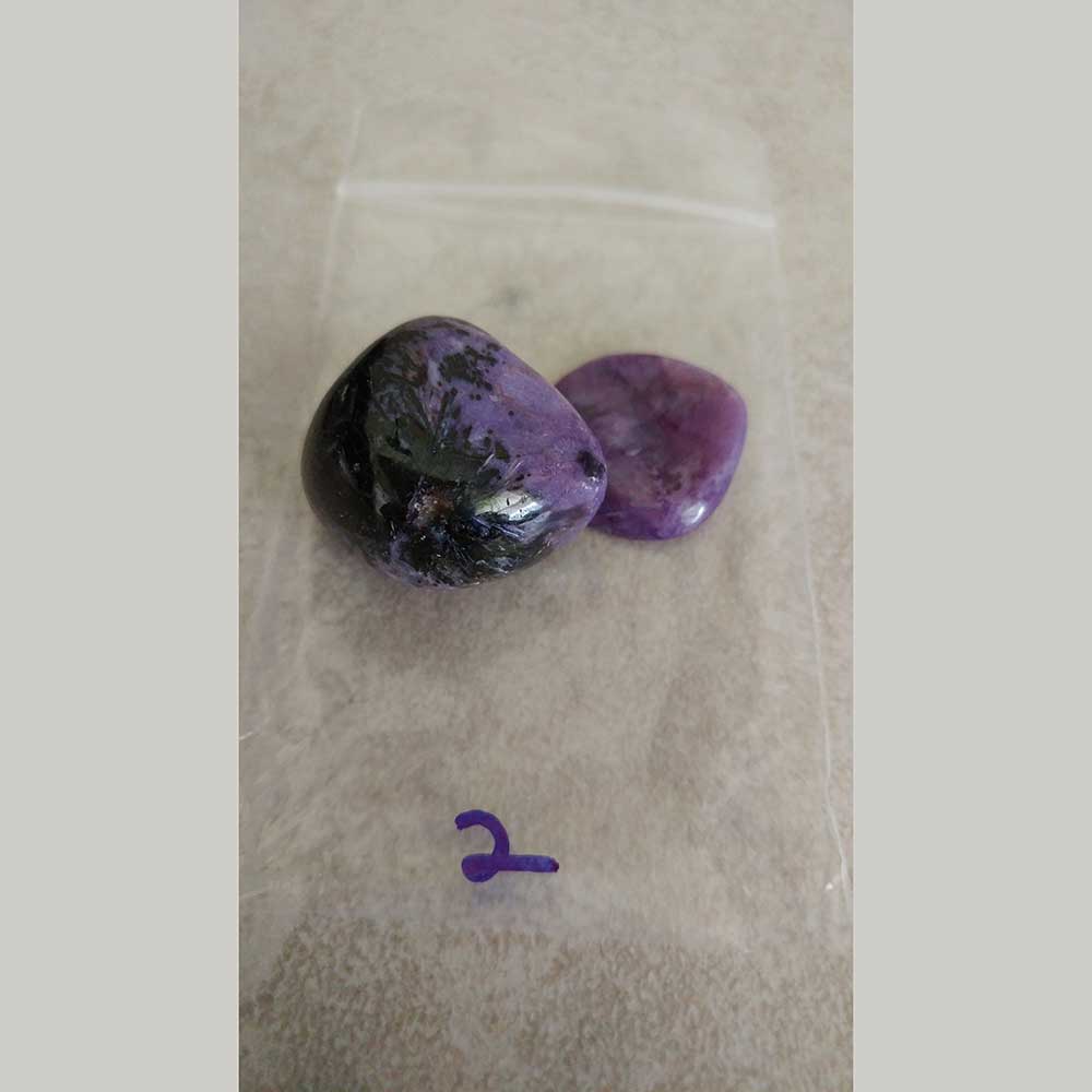 Charoite it re-energizes the body when exhausted, heals and integrates dualities and regulates blood pressure.  